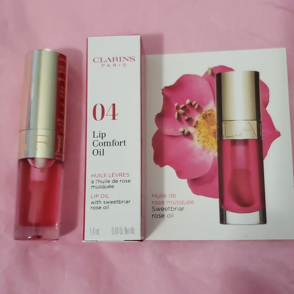 DELUXE CLARINS 04 LIP COMFORT OIL WITH SWEETBRIAR ROSE OIL.